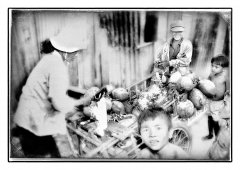 kokosnoten_verkoopster_Cambodja_aan_het_werk.jpg